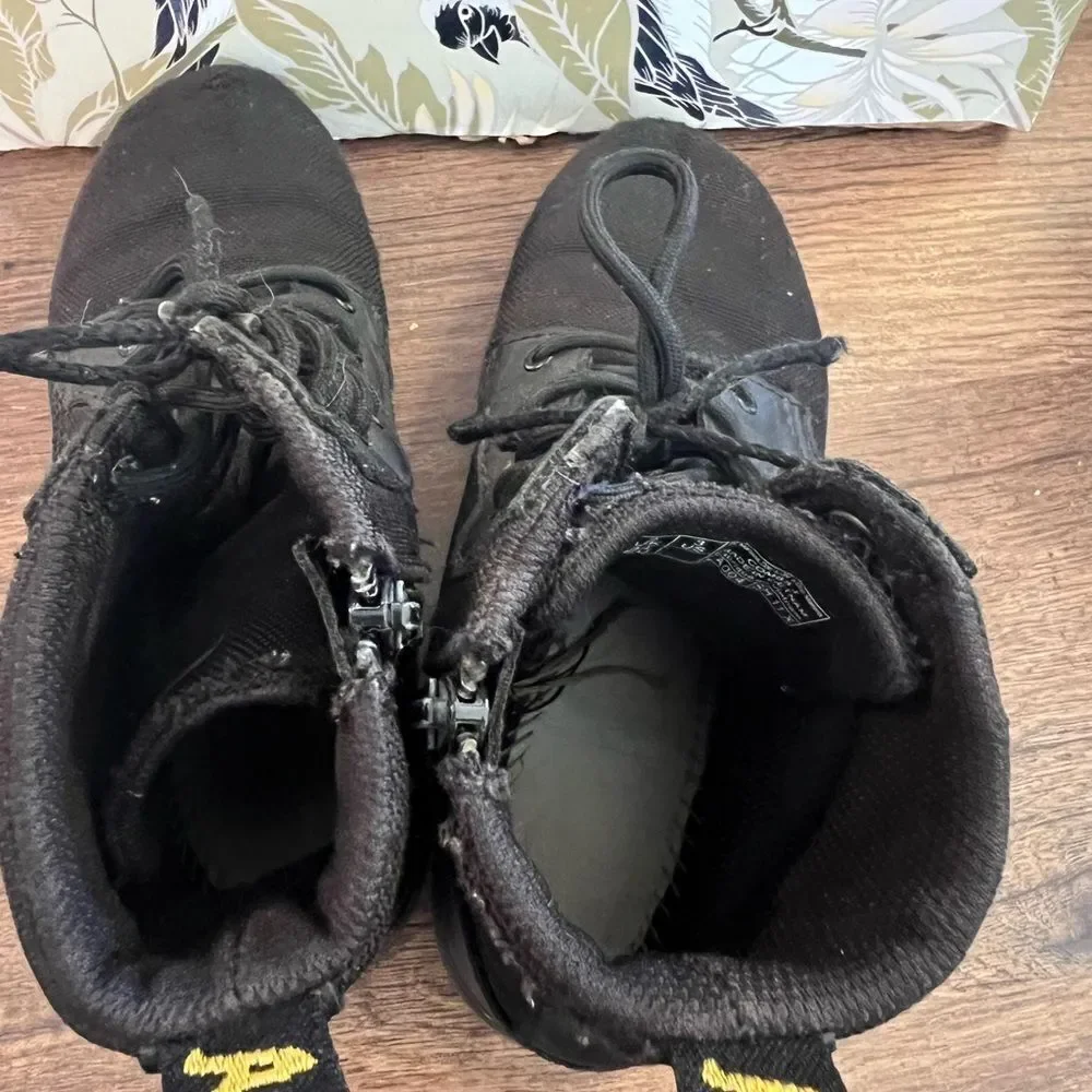 Dr. Martens Black Lace-Up Boots with side zipper.